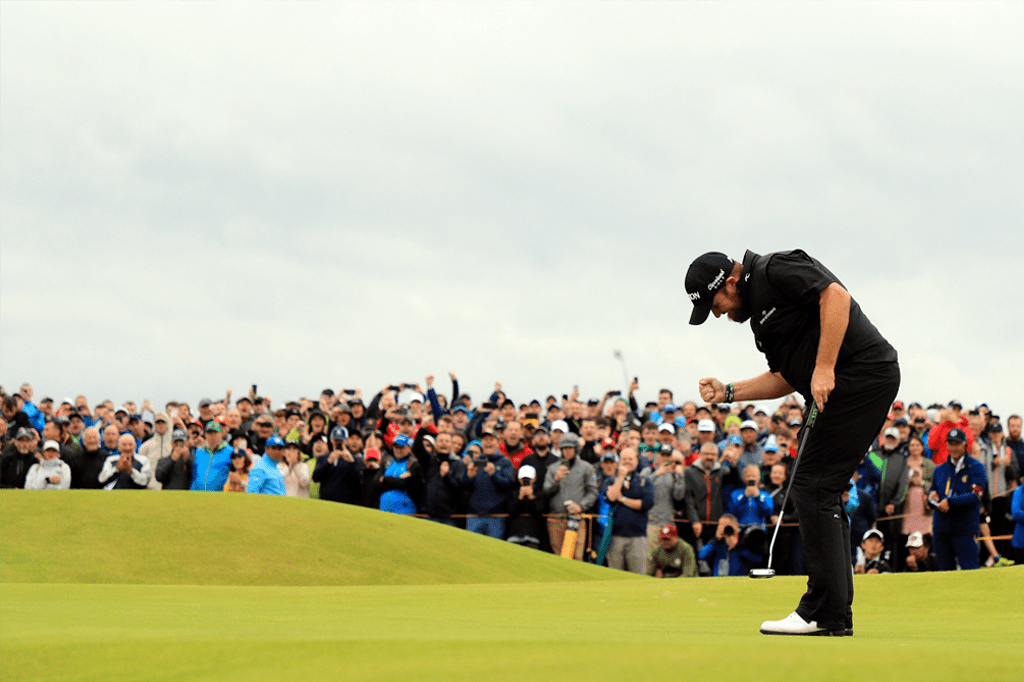 Shane Lowry celebrates after holing a putt at the 15th hole of the final round of The Open in 2019